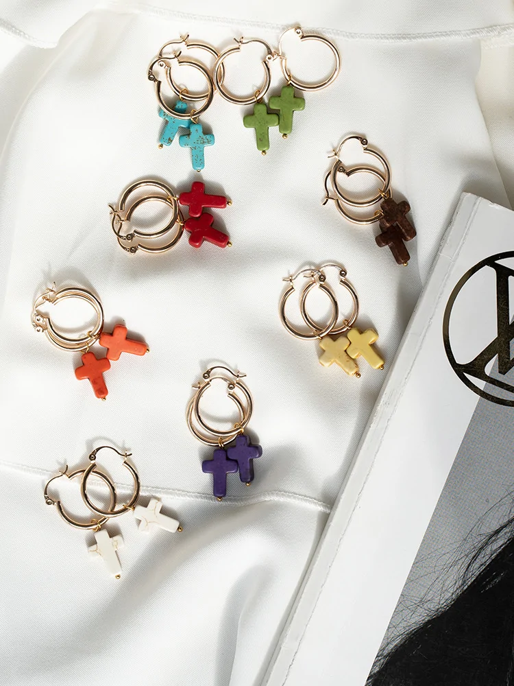 SISTINA CROSS HOOP EARRINGS...