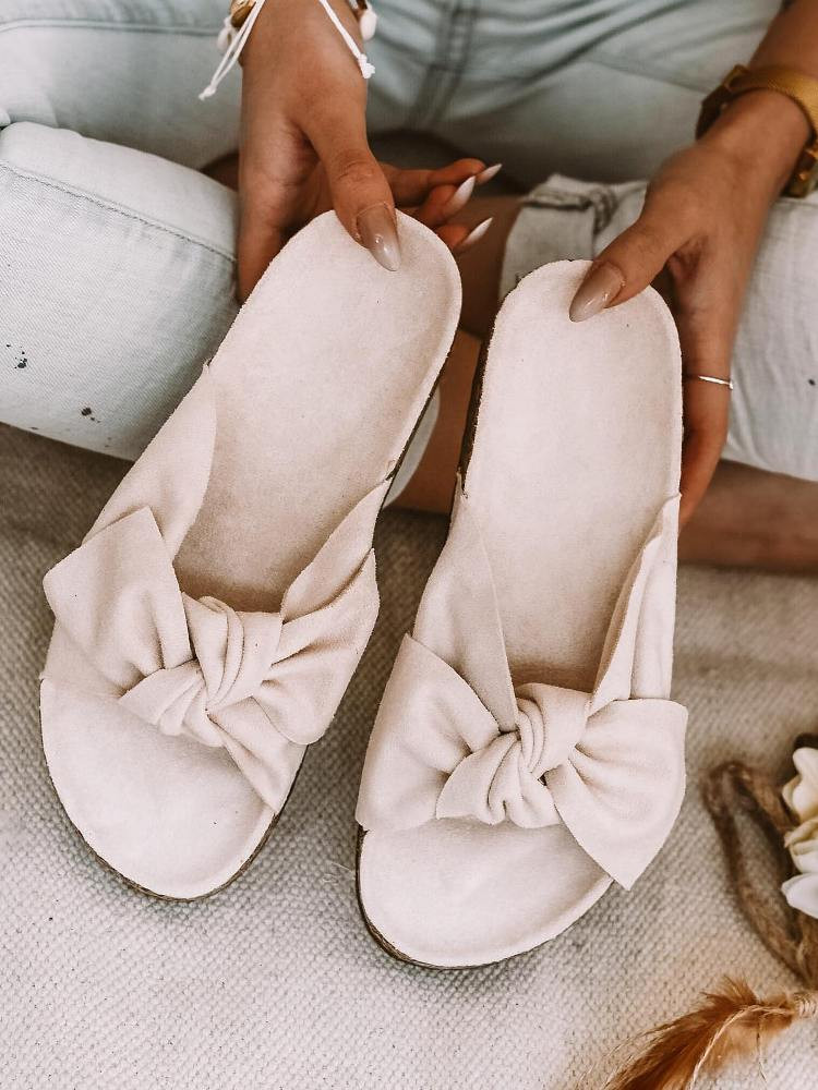 BEIGE SUEDE BOW SLIPPERS