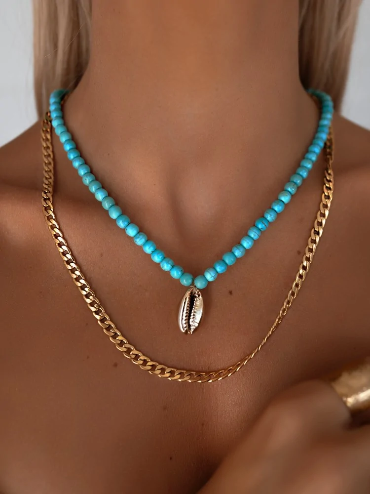 JAFAR BLUE BEADED SEASHELL...